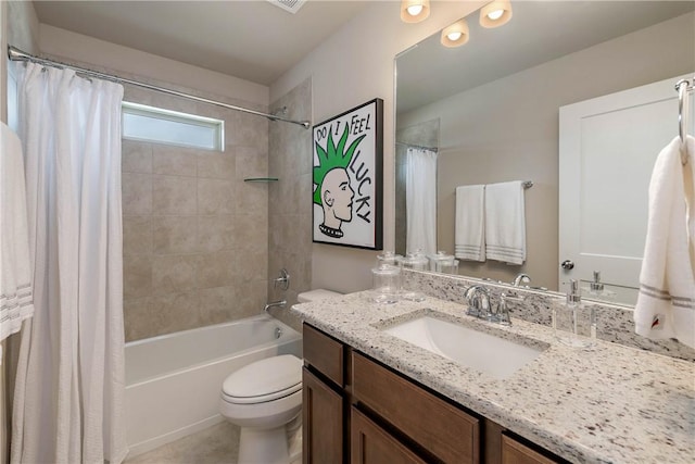 5323 Lyle Pl, Bryan, TX 77807 - full bath with toilet, vanity, shower / bath combo, and tile patterned floors