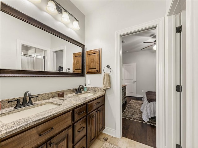 5149 Mandarin Way, College Station, TX 77845 - ensuite bathroom with double vanity and ceiling fan