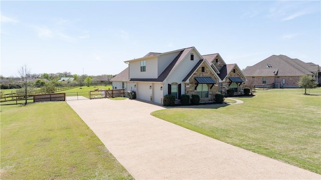 5149 Mandarin Way, College Station, TX 77845 - view of front of property featuring an attached garage, stone siding, and concrete driveway