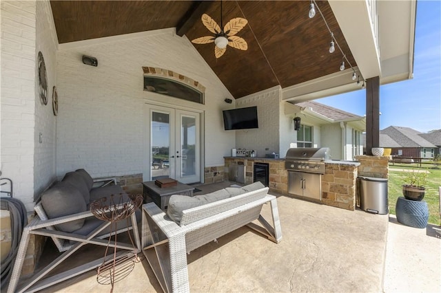 5149 Mandarin Way, College Station, TX 77845 - view of patio with french doors, exterior kitchen, ceiling fan, and wine cooler