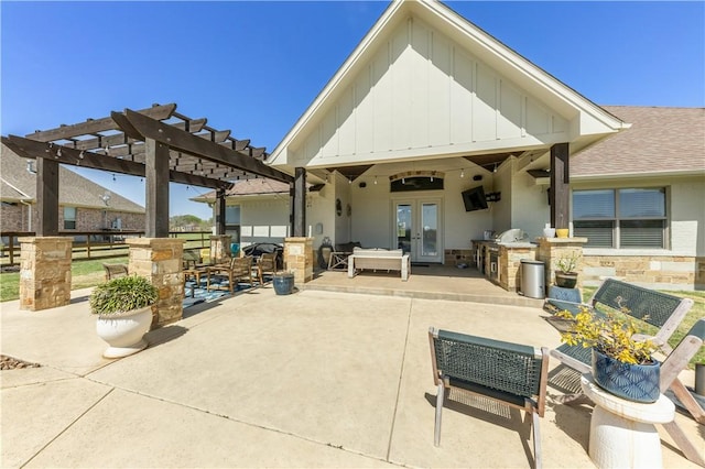 5149 Mandarin Way, College Station, TX 77845 - rear view of property with french doors, area for grilling, board and batten siding, a pergola, and a patio