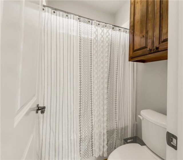 5149 Mandarin Way, College Station, TX 77845 - bathroom with toilet and a shower with curtain