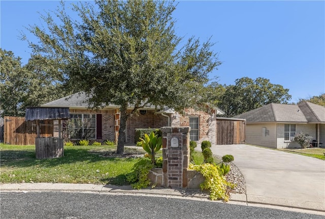 ranch-style house with a front yard