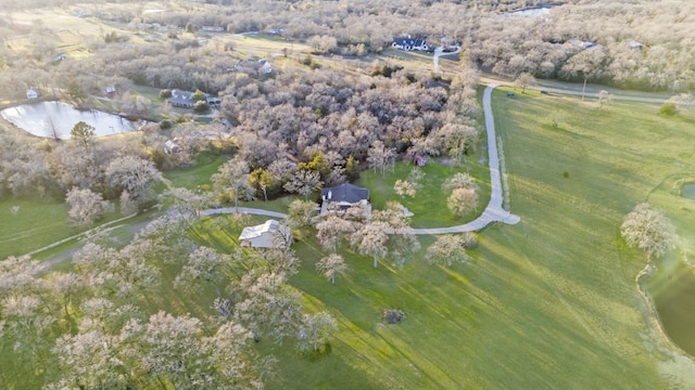 drone / aerial view featuring a rural view and a water view