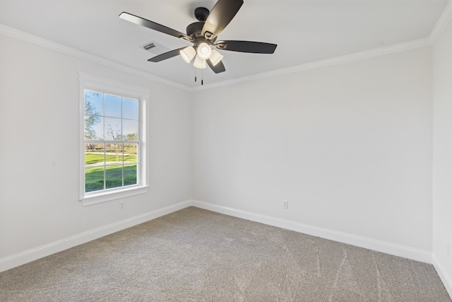 carpeted empty room with ceiling fan and ornamental molding