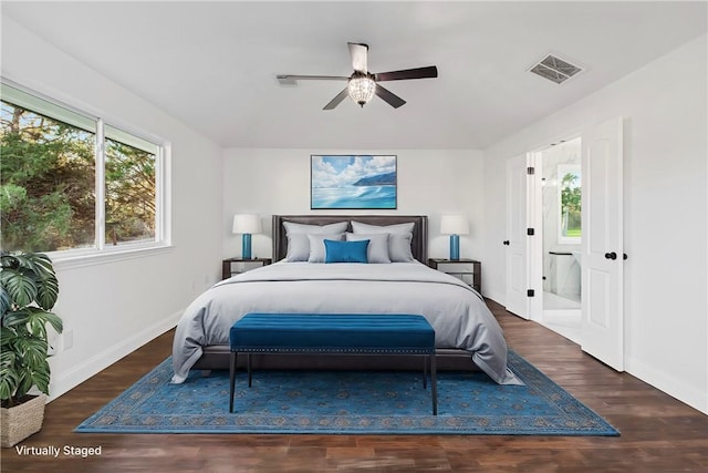 bedroom featuring ceiling fan and dark hardwood / wood-style floors