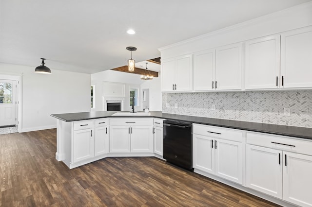 kitchen with white cabinetry, black dishwasher, backsplash, kitchen peninsula, and decorative light fixtures