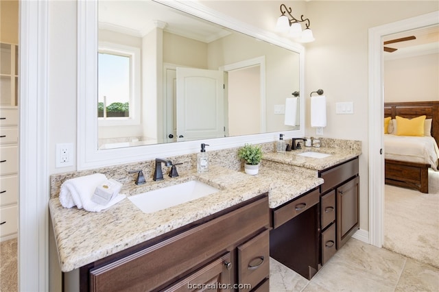 bathroom featuring vanity and ornamental molding