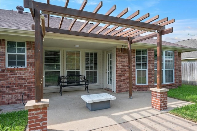view of patio / terrace featuring a pergola and fence
