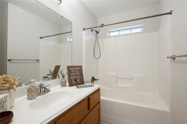 bathroom with vanity and shower / bathtub combination