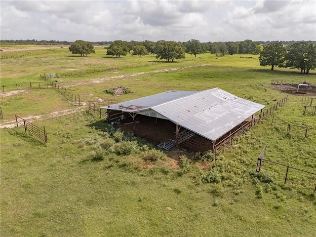 4454 Fm 60 E, Somerville, TX 77879 - entry to storm shelter featuring a view of countryside, an outdoor structure, and an exterior structure