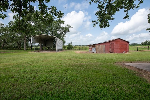 4454 Fm 60 E, Somerville, TX 77879 - view of yard featuring a carport and an outbuilding
