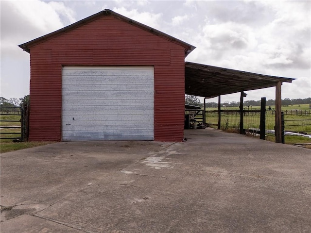 4454 Fm 60 E, Somerville, TX 77879 - garage with concrete driveway and a garage