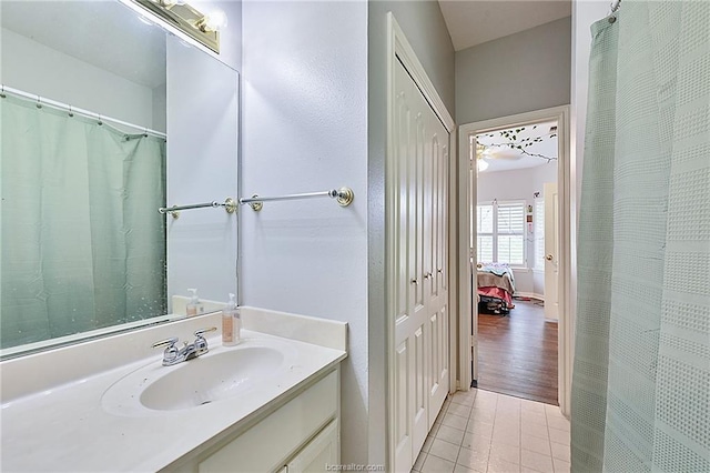 bathroom featuring hardwood / wood-style flooring and vanity