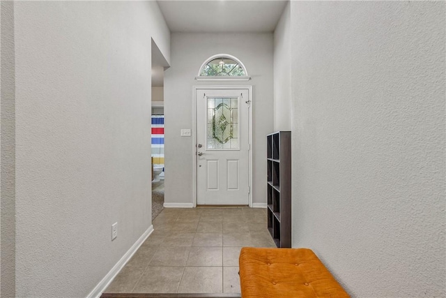 view of tiled foyer entrance