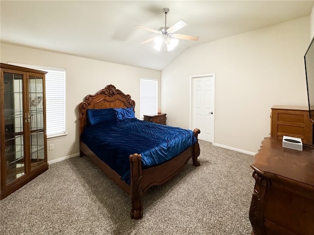 carpeted bedroom featuring ceiling fan and lofted ceiling