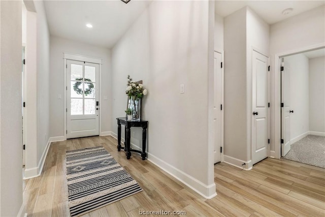 entrance foyer with light wood-type flooring