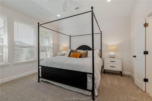 carpeted bedroom featuring ceiling fan