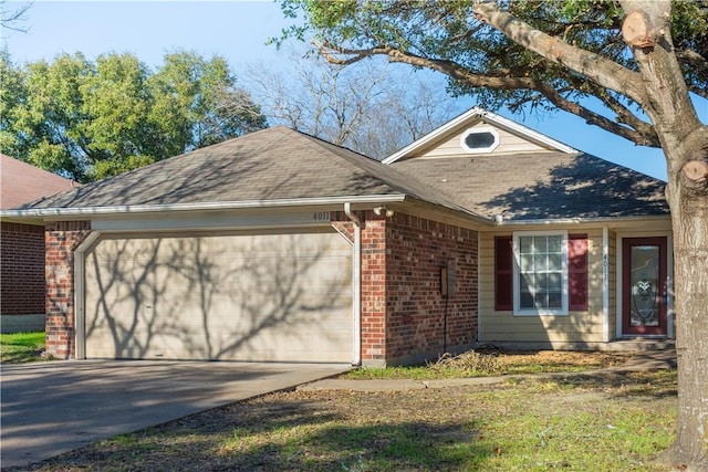 view of front of property featuring driveway, brick siding, roof with shingles, and an attached garage