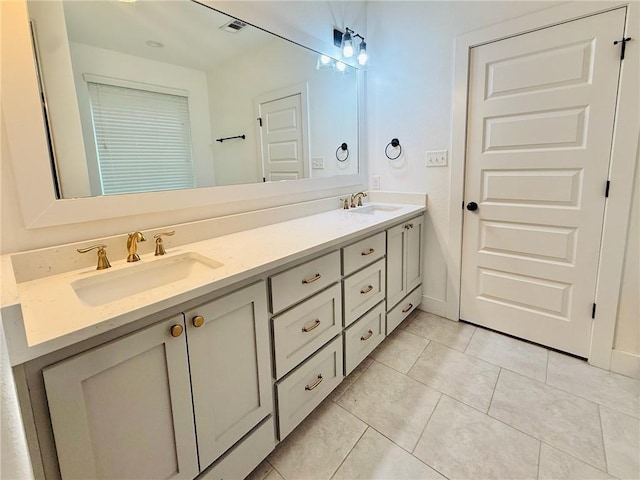4020 Brownway Dr, College Station, TX 77845 - full bathroom with double vanity and tile patterned flooring