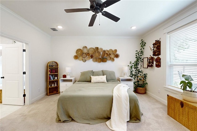 bedroom featuring baseboards, light carpet, ornamental molding, and visible vents