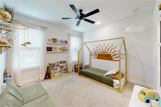 carpeted bedroom with baseboards, recessed lighting, and ceiling fan