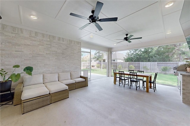 view of patio featuring ceiling fan, outdoor dining space, a fenced backyard, and an outdoor living space