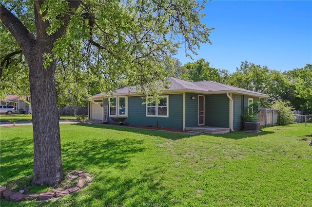 ranch-style home with a front yard