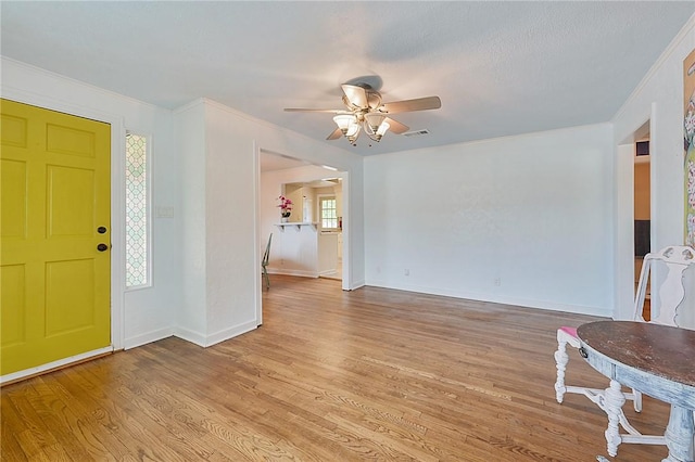 809 Coulter Dr S, Bryan, TX 77803 - entrance foyer featuring light wood-type flooring and ceiling fan