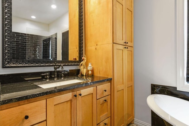 bathroom with vanity and separate shower and tub