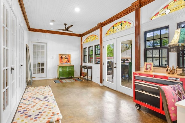 sunroom with ceiling fan, wood ceiling, and french doors