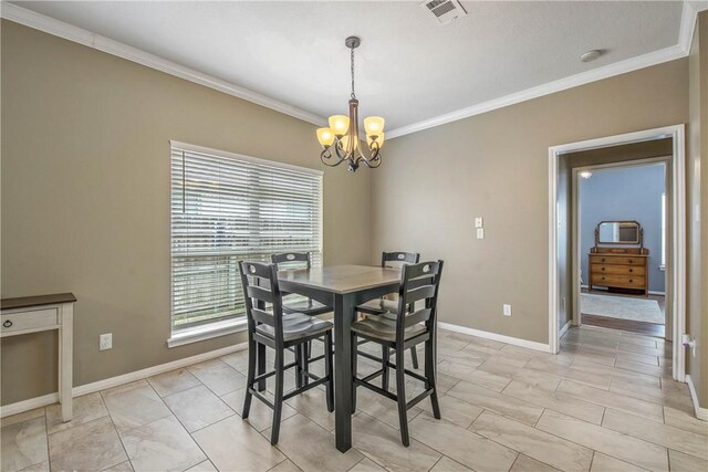 dining space with visible vents, baseboards, an inviting chandelier, and ornamental molding