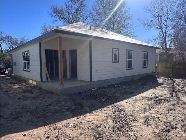 back of property with a patio area