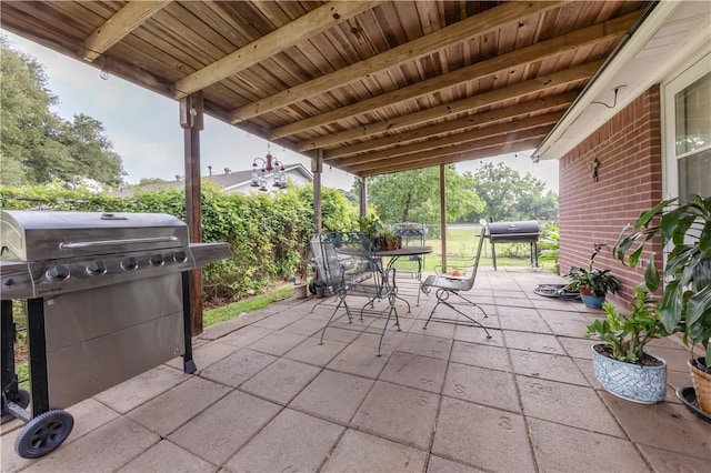 9939 County Road 272, Somerville, TX 77879 - view of patio / terrace with outdoor dining space and a grill