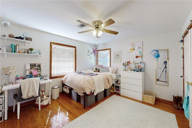 bedroom featuring ceiling fan and wood-type flooring