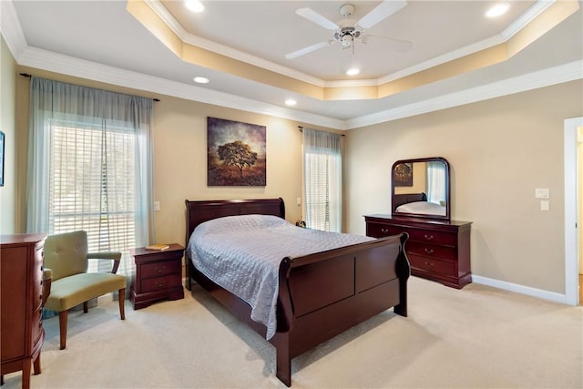 bedroom with ornamental molding, a raised ceiling, light carpet, and baseboards