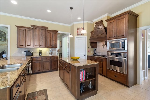 kitchen with stainless steel appliances, crown molding, a sink, and custom exhaust hood