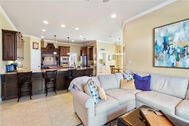 living area featuring a chandelier, ornamental molding, light tile patterned flooring, and recessed lighting