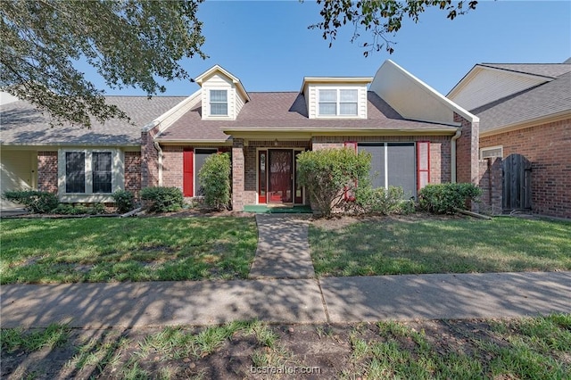 view of front of property with a front lawn