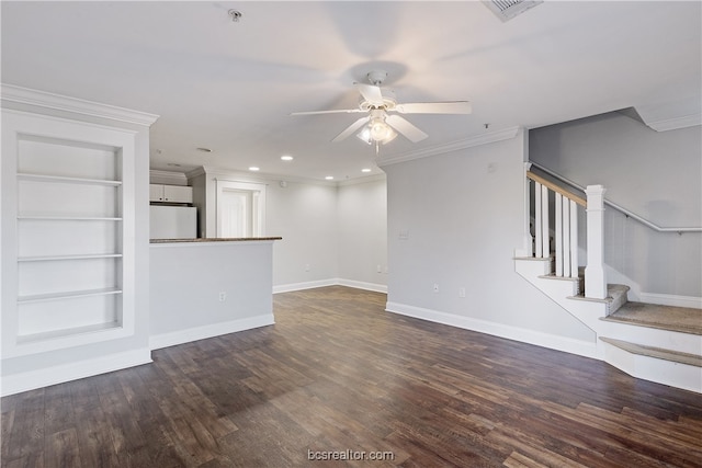 unfurnished living room featuring dark hardwood / wood-style flooring, ceiling fan, and ornamental molding