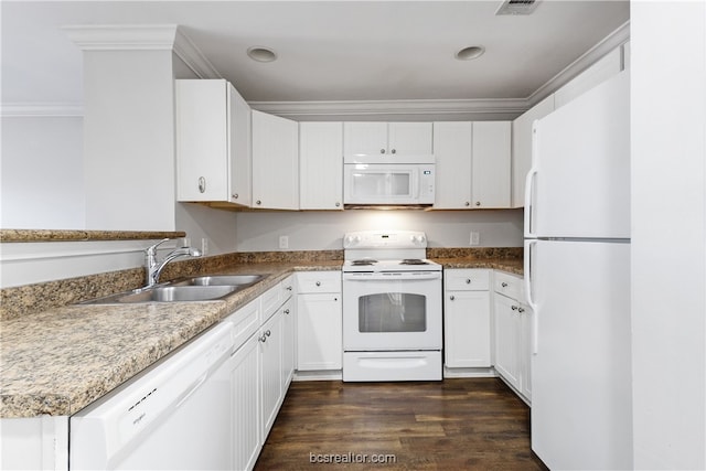 kitchen with white cabinets, dark hardwood / wood-style floors, white appliances, and sink