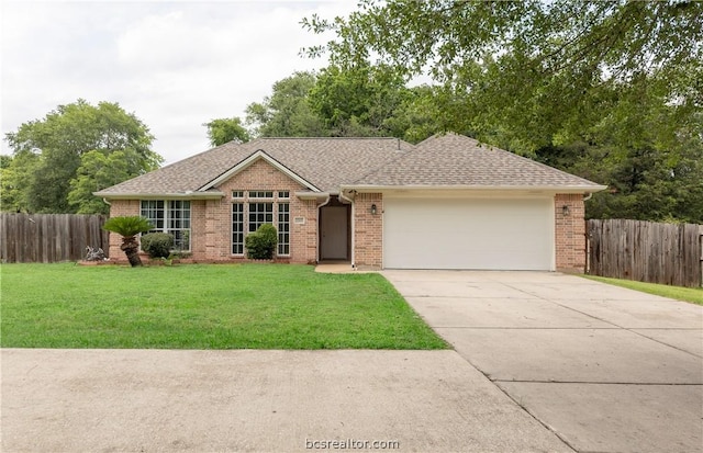 single story home with a front lawn and a garage