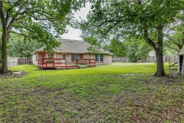 view of yard featuring a wooden deck