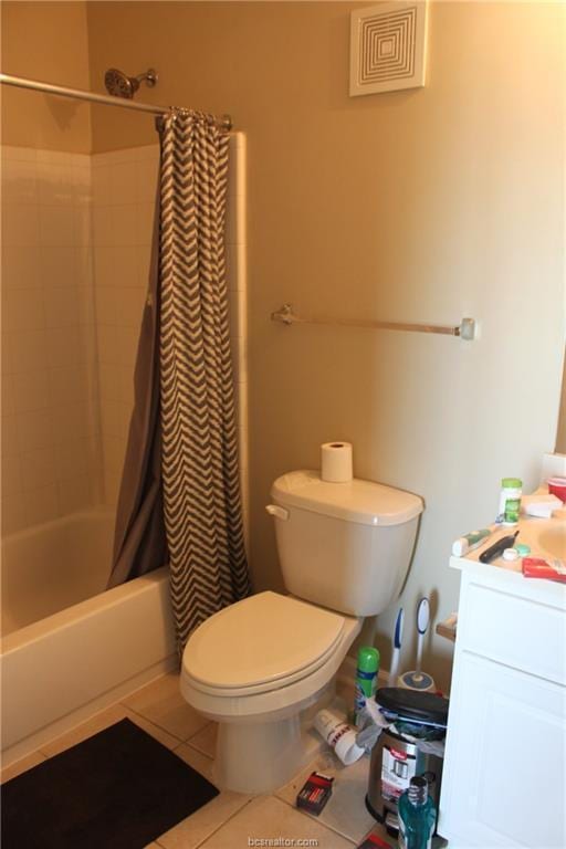 1725 Harvey Mitchell Pkwy S Unit 1724, College Station, TX 77840 - full bathroom featuring shower / bath combo with shower curtain, tile patterned floors, and vanity