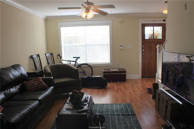 1725 Harvey Mitchell Pkwy S Unit 1724, College Station, TX 77840 - living area with healthy amount of natural light, wood finished floors, ceiling fan, and ornamental molding