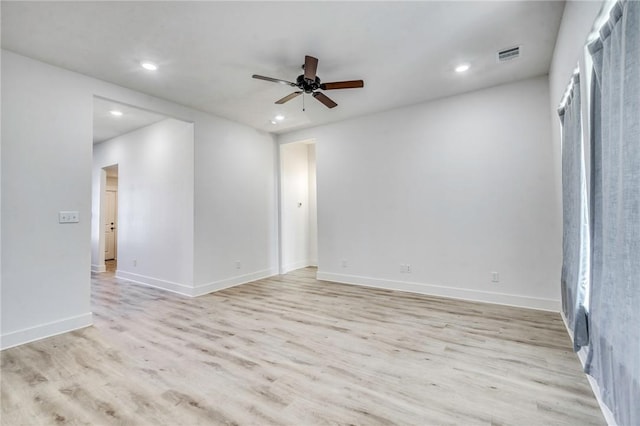 unfurnished room with visible vents, baseboards, ceiling fan, recessed lighting, and light wood-style floors