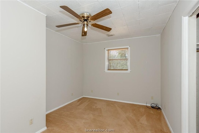 10933 Clyde Accord Rd, Franklin, TX 77856 - carpeted spare room featuring ceiling fan and crown molding