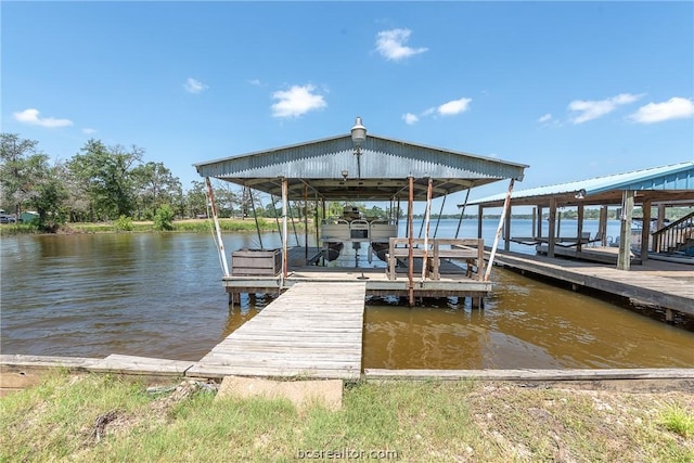 view of dock with a water view