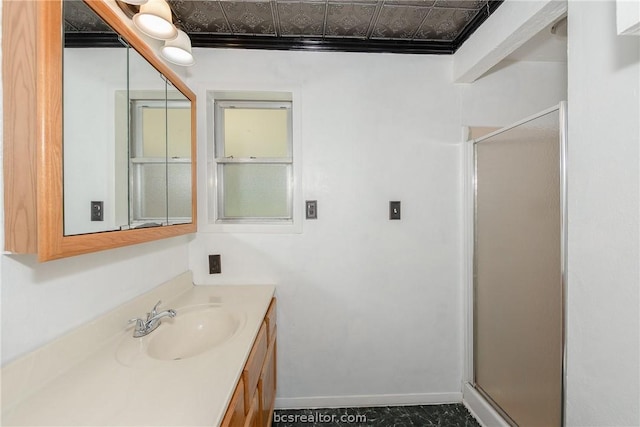 bathroom featuring vanity, walk in shower, and ornamental molding