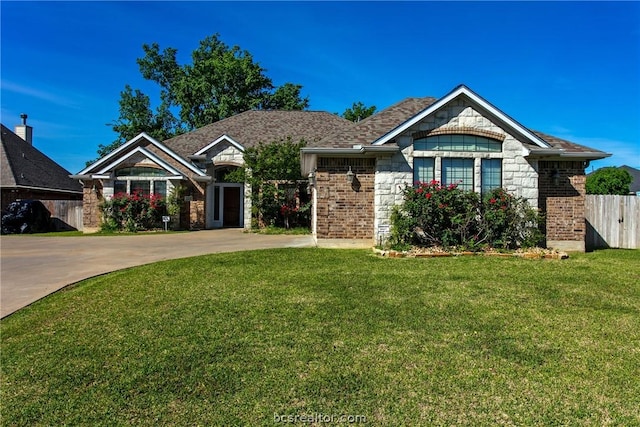 view of front of house with a front lawn